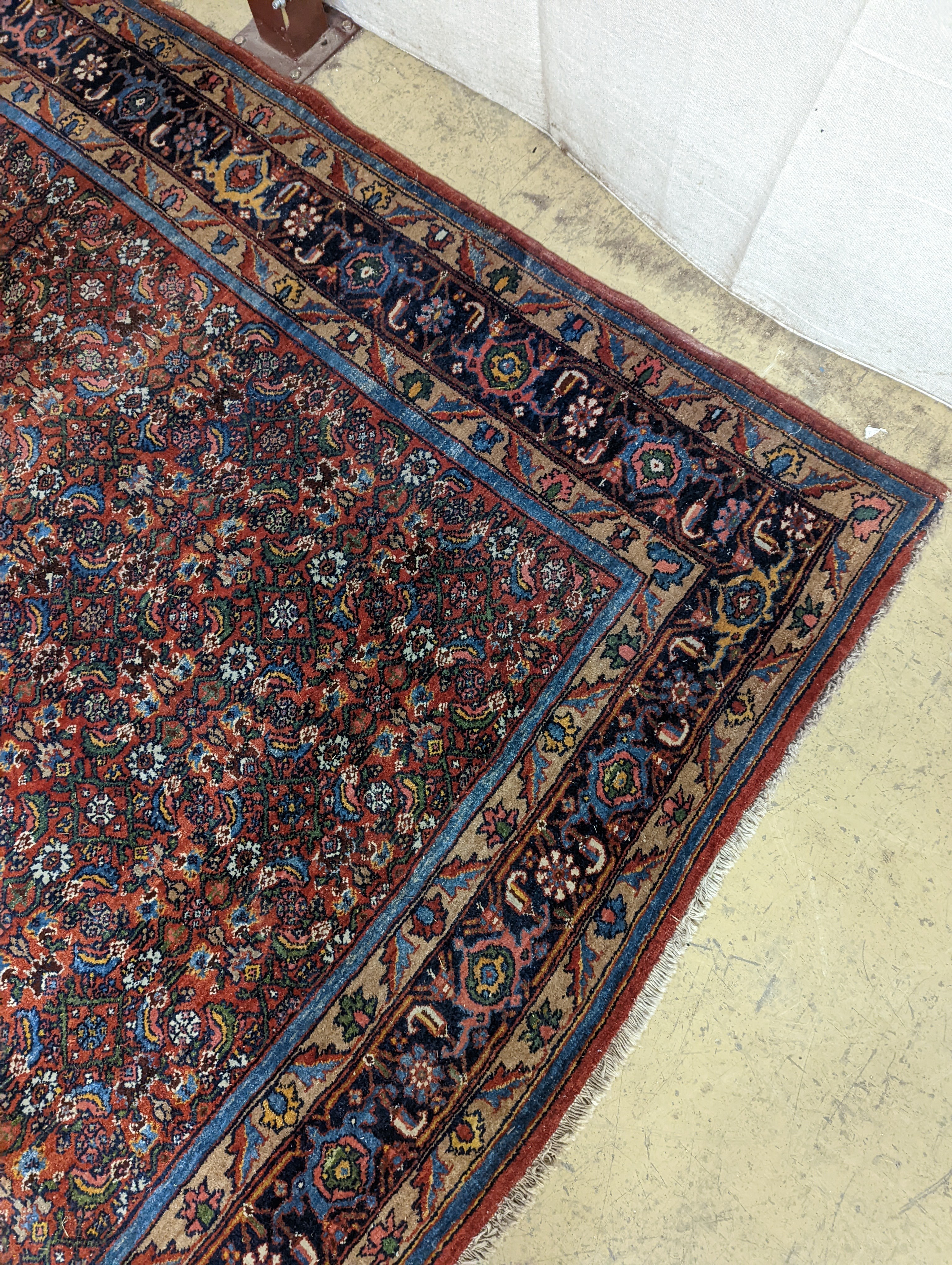 A North West Persian red ground carpet, 360 x 250cm